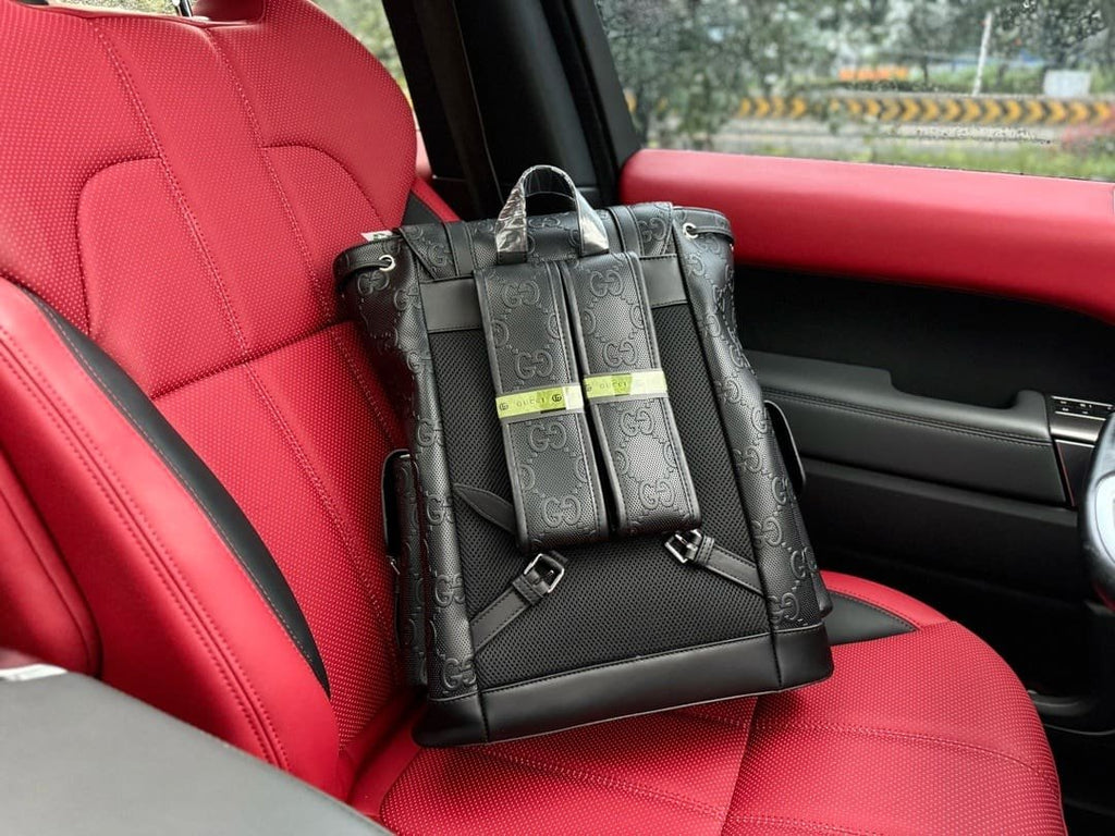 Gucci GG Leather Logo Embossed Backpack