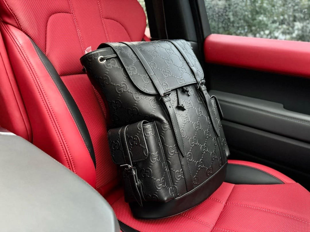 Gucci GG Leather Logo Embossed Backpack